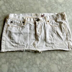 Hollister white short distressed skirt.